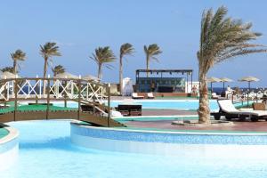 The swimming pool at or close to Three Corners Sea Beach Resort