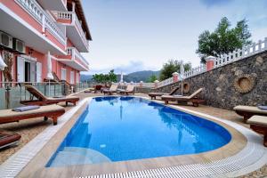 Bazén v ubytování Angela Pool Apartments nebo v jeho okolí