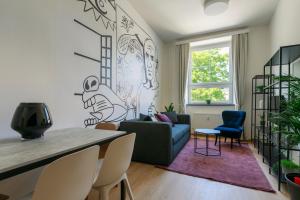 TV a/nebo společenská místnost v ubytování Avantgarde apartments