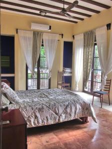 Katil atau katil-katil dalam bilik di Casa de los Pianos