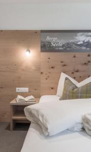 Postel nebo postele na pokoji v ubytování Garni Ötztal ROOMS & APARTS