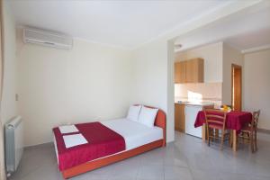 Postel nebo postele na pokoji v ubytování Apartments Konte
