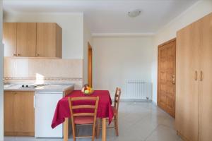 Kuchyň nebo kuchyňský kout v ubytování Apartments Konte