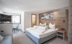 Postel nebo postele na pokoji v ubytování Garni Ötztal ROOMS & APARTS