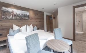 Postel nebo postele na pokoji v ubytování Garni Ötztal ROOMS & APARTS