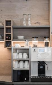 Kuchyň nebo kuchyňský kout v ubytování Garni Ötztal ROOMS & APARTS