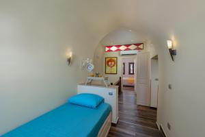 A bed or beds in a room at BIBLIOTHEQUE