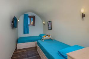 A bed or beds in a room at BIBLIOTHEQUE
