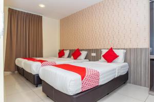 Ένα ή περισσότερα κρεβάτια σε δωμάτιο στο MK Paradise hotel