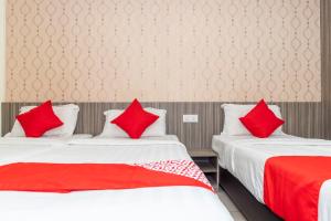 Ένα ή περισσότερα κρεβάτια σε δωμάτιο στο MK Paradise hotel