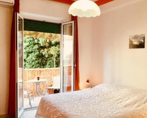 Postel nebo postele na pokoji v ubytování Casa Eleonora
