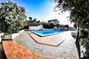 The swimming pool at or close to residence scala dei turchi