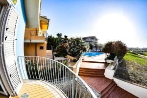 The swimming pool at or close to residence scala dei turchi Még 31 kép