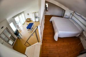 A bed or beds in a room at residence scala dei turchi