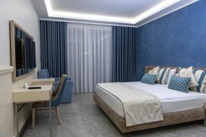 Tempat tidur dalam kamar di Sunway Hotel