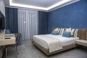 Tempat tidur dalam kamar di Sunway Hotel