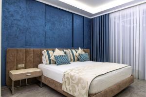 Tempat tidur dalam kamar di Sunway Hotel