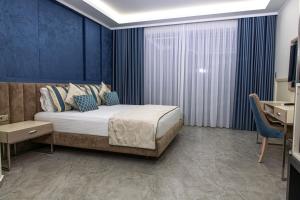 Tempat tidur dalam kamar di Sunway Hotel