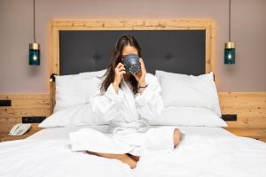 Voodi või voodid majutusasutuse Hotel Forellenhof toas
