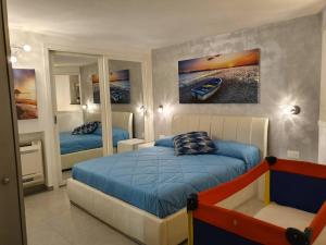 מיטה או מיטות בחדר ב-Casa Faenza