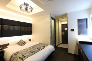 Krevet ili kreveti u jedinici u objektu Hotel Leon Hamamatsu
