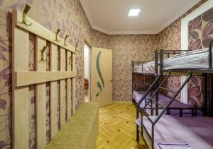 Postel nebo postele na pokoji v ubytování Tsera House