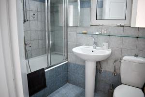 Kúpeľňa v ubytovaní OLIVER SUITES