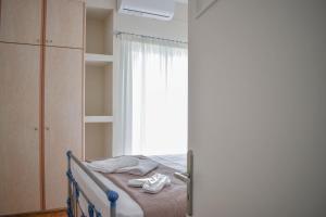 Posteľ alebo postele v izbe v ubytovaní OLIVER SUITES