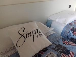 Postel nebo postele na pokoji v ubytování Agriturismo Cascina Lert