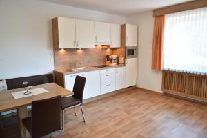 Photo de la galerie de l'établissement Ferienwohnungen Burgwies, à San Martino