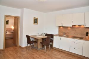 Photo de la galerie de l'établissement Ferienwohnungen Burgwies, à San Martino