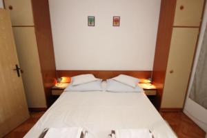 Ένα ή περισσότερα κρεβάτια σε δωμάτιο στο Boho Rooms & Apartments