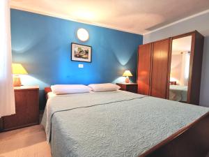 Кровать или кровати в номере Apartments Villa Amaryllis