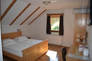 Posteľ alebo postele v izbe v ubytovaní Ethno House Izvor