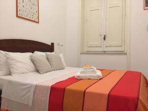 A bed or beds in a room at YooRoom
