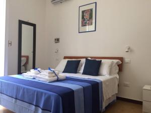 A bed or beds in a room at YooRoom