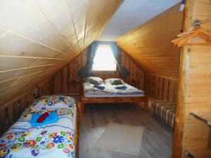 Cama ou camas em um quarto em Ranč pod Hájom
