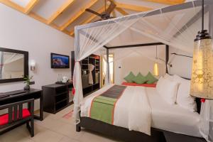 Postel nebo postele na pokoji v ubytování Vilamendhoo Island Resort & Spa