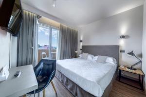 Postel nebo postele na pokoji v ubytování Hotel Select Suites & Spa - Apartments