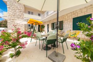 Photo de la galerie de l'établissement Apartmani Ujdur, à Gradac