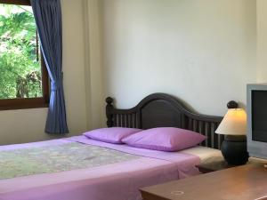 Cama o camas de una habitación en Sunrise Bungalow