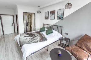 Voodi või voodid majutusasutuse Xiamen Guiran Hostel toas