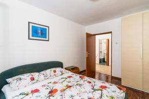 Posteľ alebo postele v izbe v ubytovaní Apartman Fani