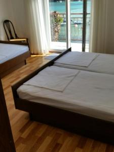 Posteľ alebo postele v izbe v ubytovaní Vukotić Beach house