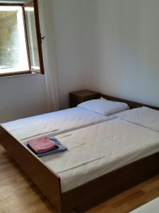 Posteľ alebo postele v izbe v ubytovaní Vukotić Beach house