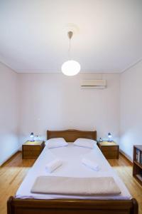 Postel nebo postele na pokoji v ubytování Emerald House