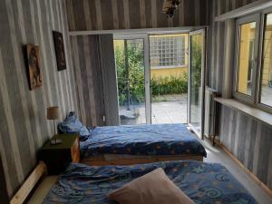 Ένα ή περισσότερα κρεβάτια σε δωμάτιο στο CASA DI MARCO