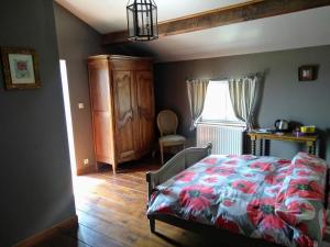 Кровать или кровати в номере La Chaumerie