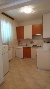Kuchyň nebo kuchyňský kout v ubytování Apartman Franka
