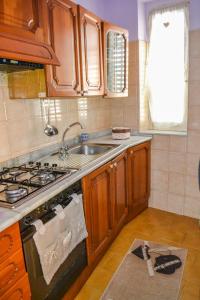 Kuchyňa alebo kuchynka v ubytovaní Rua House + 14 fotografií